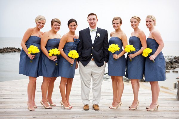 navy bridesmaid dresses yellow bouquets